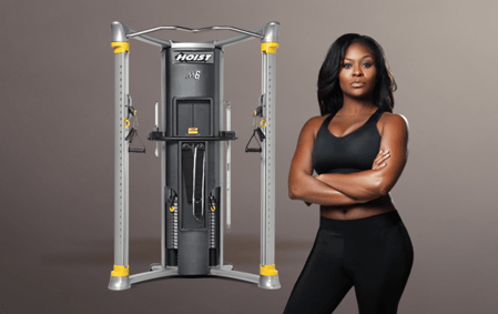 Woman Standing in Front of Hoist Gym