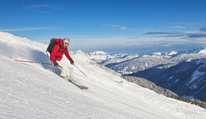 Athlete Skiing Down a Slope