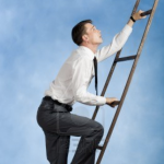Man Climbing Up A Ladder