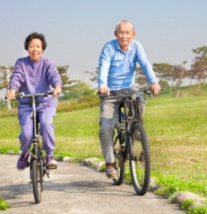Elderly Couple Biking