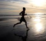 Athlete Running on the Beach